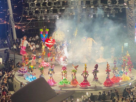 The 2022 Guelaguetza in the magical land with 8 regions, Oaxaca, Mexico. Beautiful display of fireworks, traditional clothing, and a festive environment. 